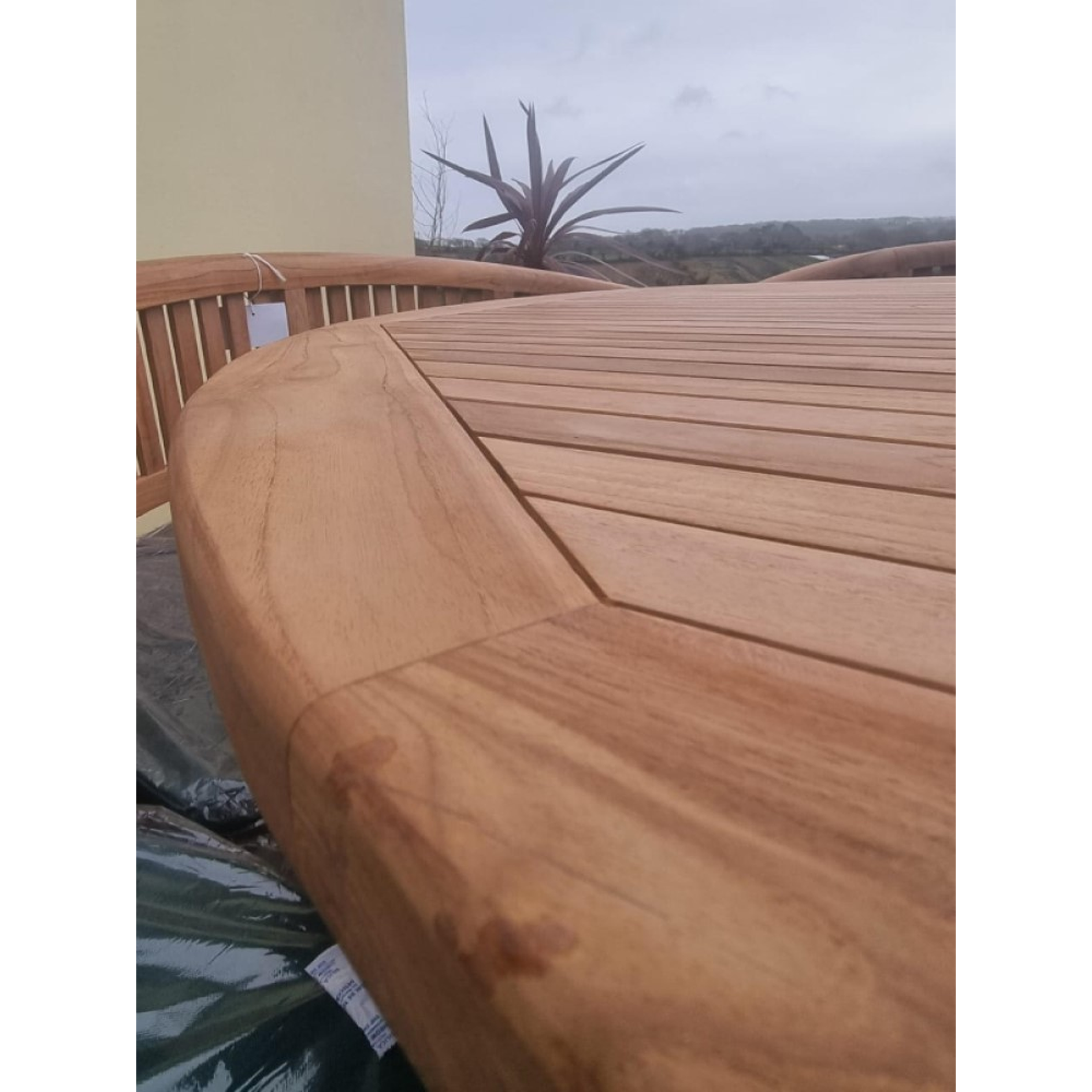 Teak garden dining set. 1.8m “Titan” round table, 4 bowwood style seats